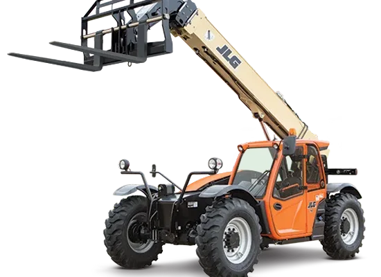 Orange telehandler with extended boom holding pallet forks attachment against white background.